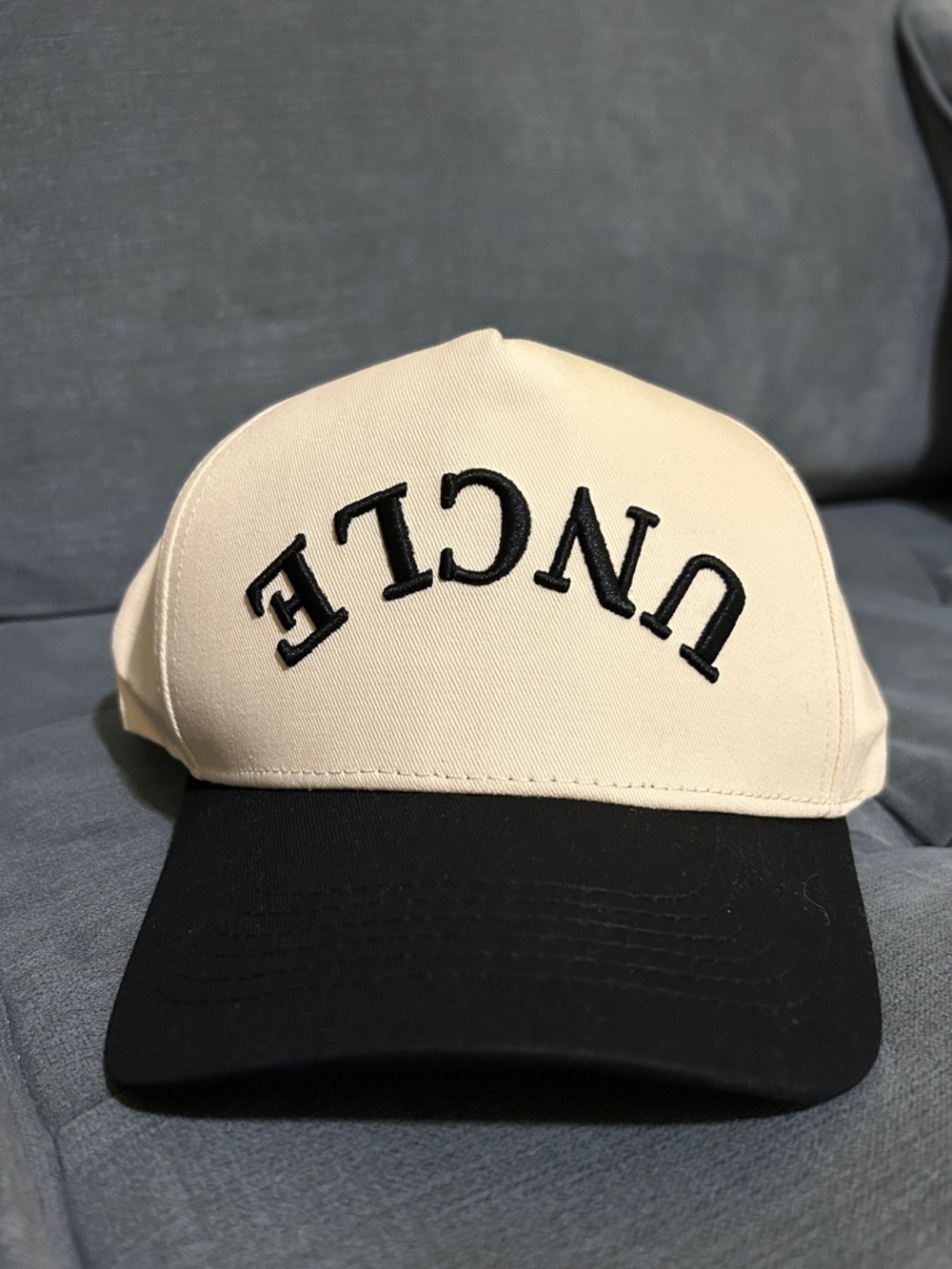 Cream and Black Baseball Cap with upside down 'UNCLE' Embroidery